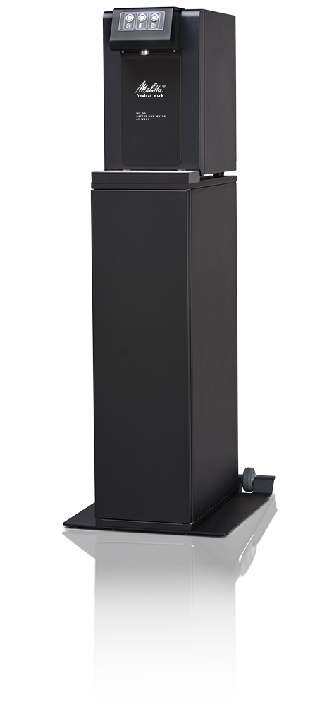 Unser Wasserspender auf einem Unterschrank, perfekt zum Aufstellen, wenn kein Platz ist 